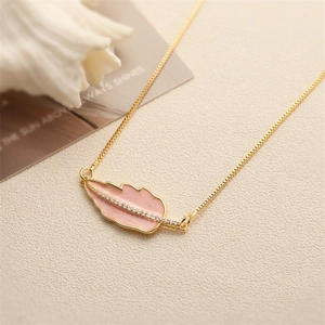 Pink enamel leaf pendant necklace with white zircons on a delicate gold box chain