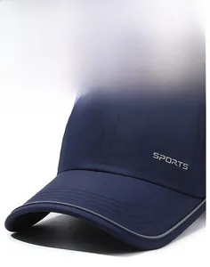 Close-up of navy sports cap featuring reflective brim edge and grey SPORTS print