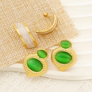 Chic gold-plated C-shape hoops and vintage green cat-eye stud earrings for women