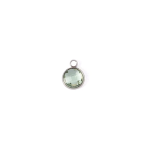 Detailed close-up of a 7mm round faceted green birthstone charm with silver metal bezel setting