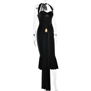 Detail of elegant black halter dress with sweetheart neckline and gold buckle accent