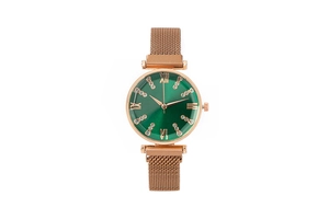 Detail of rose gold magnetic Milanese strap and sunray green dial with Roman numerals