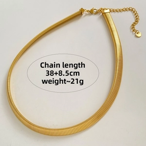 Detail of gold-plated stainless steel snake bone chain with lobster clasp and extension