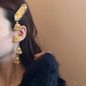 Ethnic gold hair clip with floral engraving and jingling bell tassel drop design