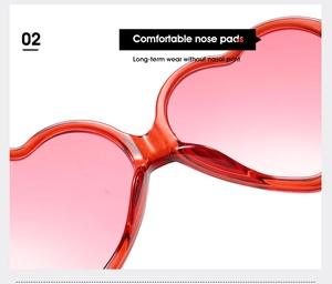 Close-up of comfortable nose pads on heart-shaped sunglasses with pink gradient lenses