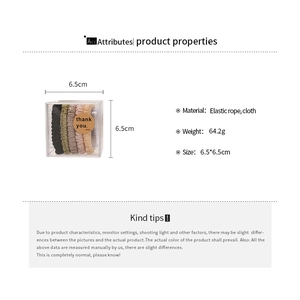 Detailed view of 5-piece fabric hair scrunchie set in a clear box with dimensions