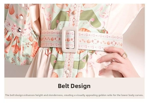 Detailed view of ocean print dress waist with matching belt and square resin buckle