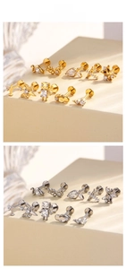 Detailed display of titanium labret studs with zircon inlays in gold and silver finishes