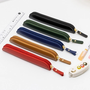 Five slim leather pencil cases in red brown navy green black with gold zippers