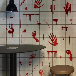 Spooky blood handprints and footprints wall stickers on white tiles for Halloween decor