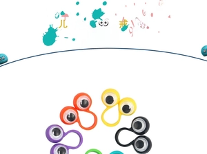 Close-up of colorful plastic googly eye rings for kids in red, blue, and yellow