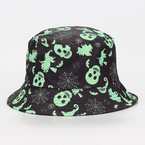 Detail view of black bucket hat with fluorescent green Halloween witch and skull patterns