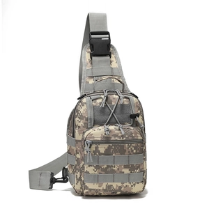 Close-up of digital camouflage tactical chest bag with nylon straps and buckles
