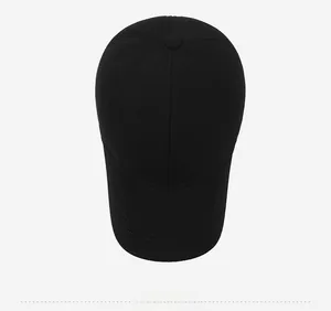 Vertical top view of black winter baseball cap with visitor embroidery detail