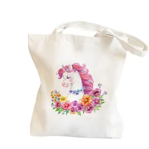 Unicorn and floral watercolor print canvas tote bag for women on white background