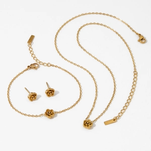 Elegant gold stainless steel rose flower jewelry set including necklace bracelet and earrings