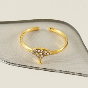 Adjustable 18k gold ginkgo leaf ring with sparkling heart shaped diamond accents