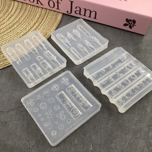 4-pack silicone nail art molds with feathers, clock gears, bows and heart relief patterns