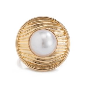 Chunky gold textured open ring featuring a large centered white pearl in retro metal style
