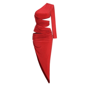 Detail of red one-shoulder evening gown with rhinestones and asymmetric cutouts