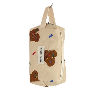 Quilted beige cosmetic bag with brown bear pattern and handle for travel storage