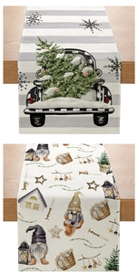 Detailed view of polyester Easter table runners with festive prints on wooden table
