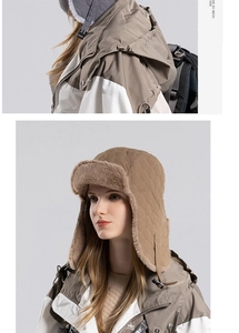 Detail of khaki aviator hat with thick faux fur lining and quilted diamond stitching