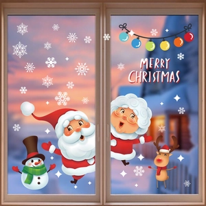 Christmas static window clings set with Santa, reindeer and snowman on a glass window