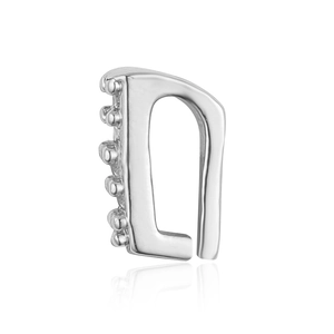 Detailed close-up of a silver D-shaped earring with delicate bead embellishments