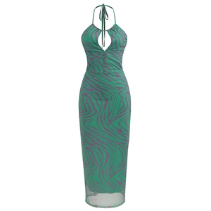 Detailed view of green zebra print halter neck dress featuring a central cutout detail
