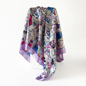 Detail of premium satin silk scarf with colorful cartoon cat print on purple background