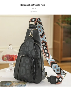 Close-up of leopard print PU leather crossbody bag with wide bohemian guitar strap