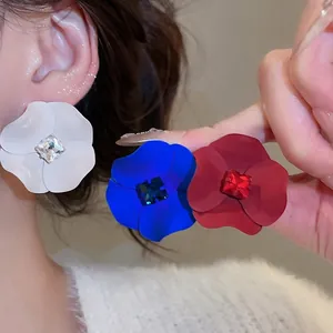 Elegant floral stud earrings in white blue and red with central square gemstone inlay