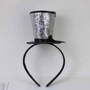 Detail of silver sequin mini top hat headband with black bow for Halloween party decor