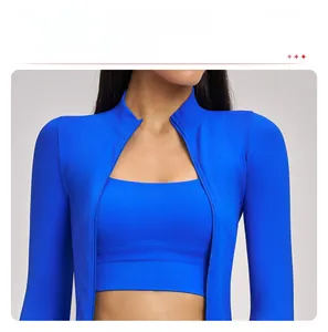 Detail of royal blue zip-up yoga jacket with stand-up collar and matching sports vest
