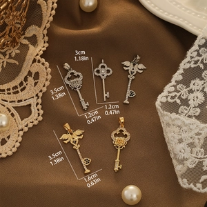 Golden and silver zircon micro-pave key pendants with precise size measurements