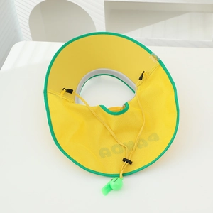 Detail of yellow mesh neck protection and green whistle on children sun hat