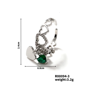 Detail showing silver heart ring dimensions 2.4cm with green gemstone and clear zircons
