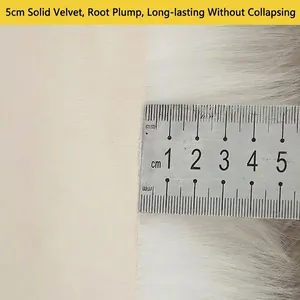 White faux fur rug with 5cm pile height measured by a steel ruler for quality check