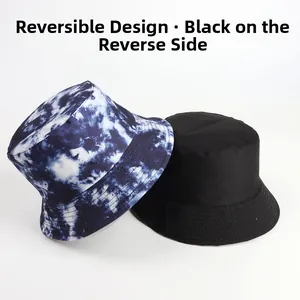 Reversible bucket hat showing blue tie-dye pattern and minimalist solid black inner side