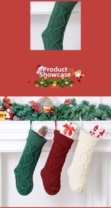 Close-up of three-color knit Christmas stockings hanging on a festive mantel with greenery