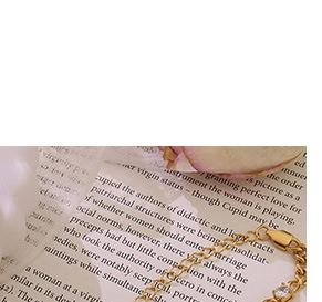 Detail of 18K gold plated chain with lobster clasp and sparkling zircon stone