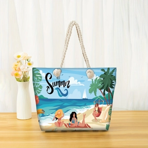 Detail of rope handles and vibrant Hello Summer print on large beach tote bag