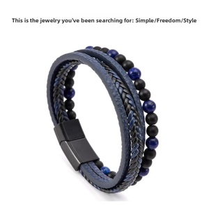 Detail of multi-layer blue braided leather bracelet with magnetic beads and alloy clasp