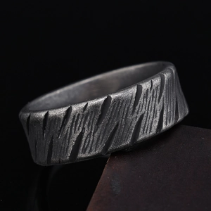 Industrial textured stainless steel ring with rugged distressed matte finish for men