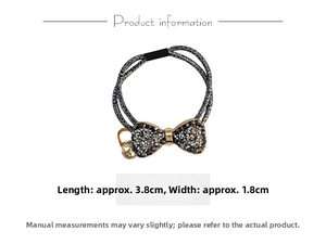 Detail of crystal bow hair tie showing 3.8cm length and double elastic bands