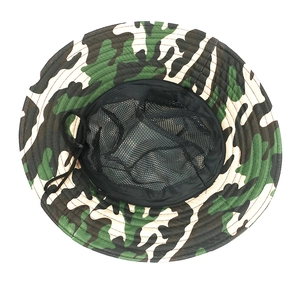 Detailed interior view of camouflage outdoor fishing hat with breathable black mesh lining