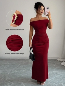 Elegant off-shoulder wine red evening gown with metallic accents and layered ruching design