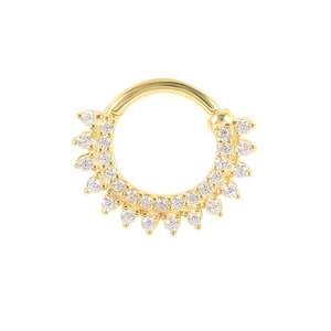 Close-up of gold-plated hinged hoop ring with shimmering cubic zirconia stones
