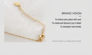 Detail of 18K gold plated extension chain with lobster clasp and K18 hallmark engraving